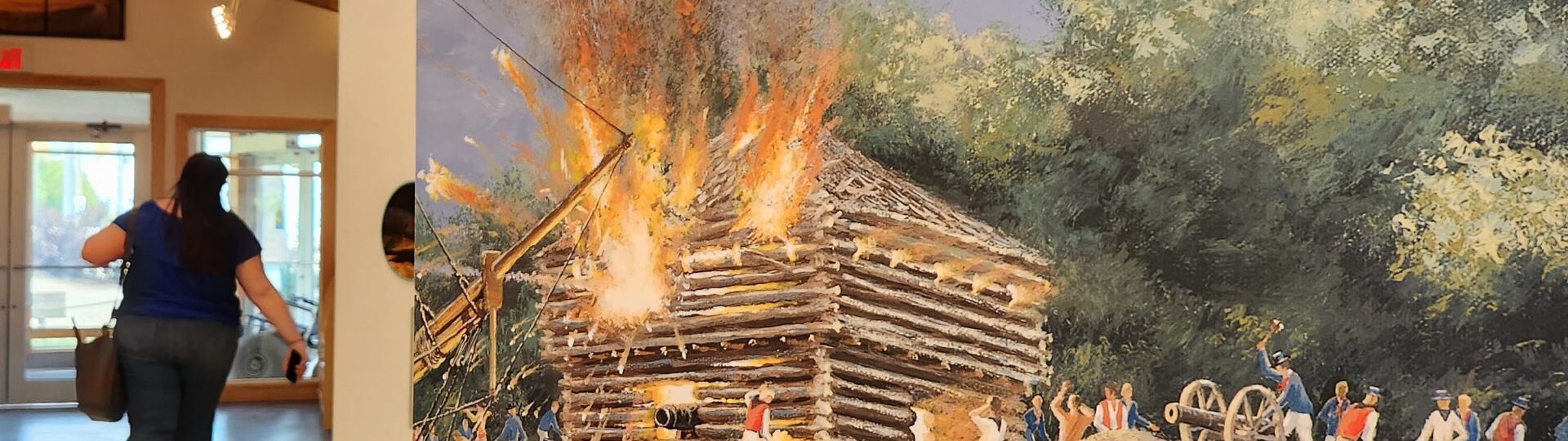 Œuvre représentant une bataille de la guerre de 1812 exposée à l’intérieur du centre d’accueil de l’île Nancy.