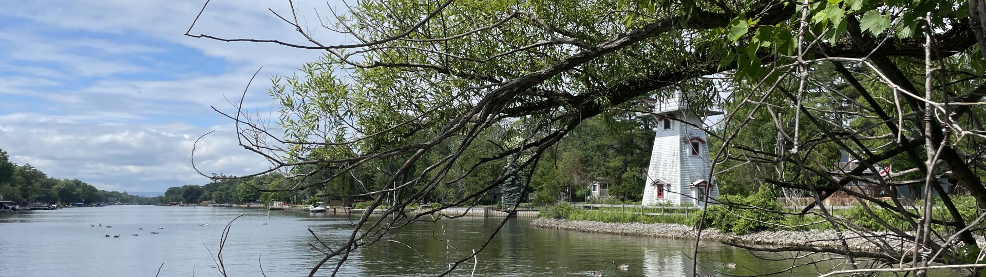 A view of the lighthouse at Nancy Island, from further down river